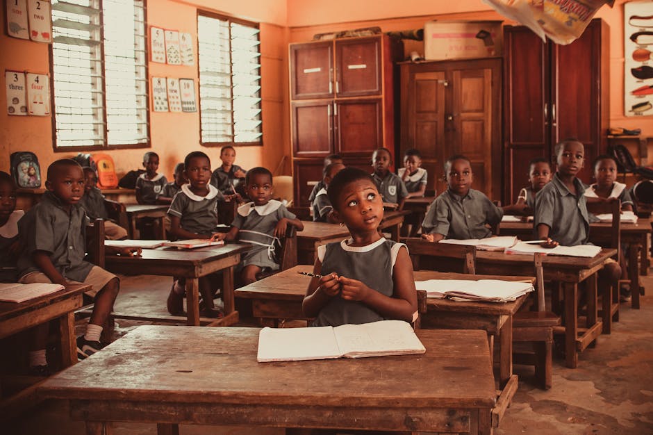 African children attentively participating in a classroom lesson